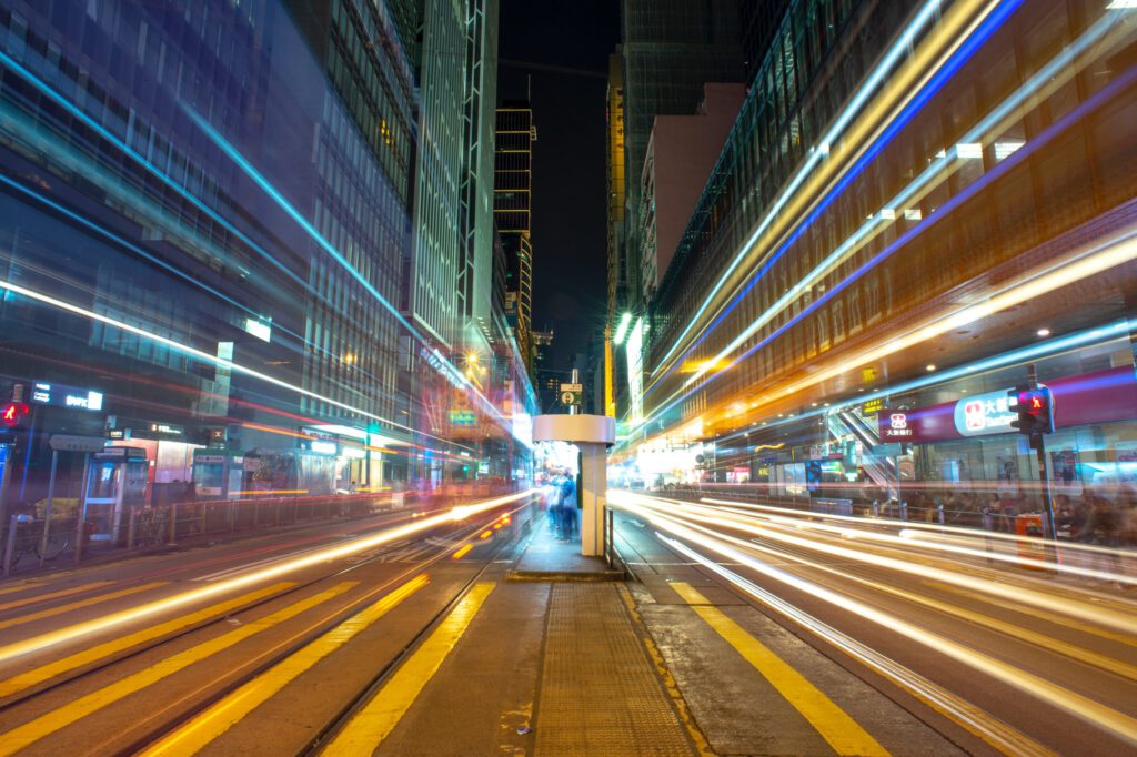 Photograph of nighttime in a city with slow exposure light streaks