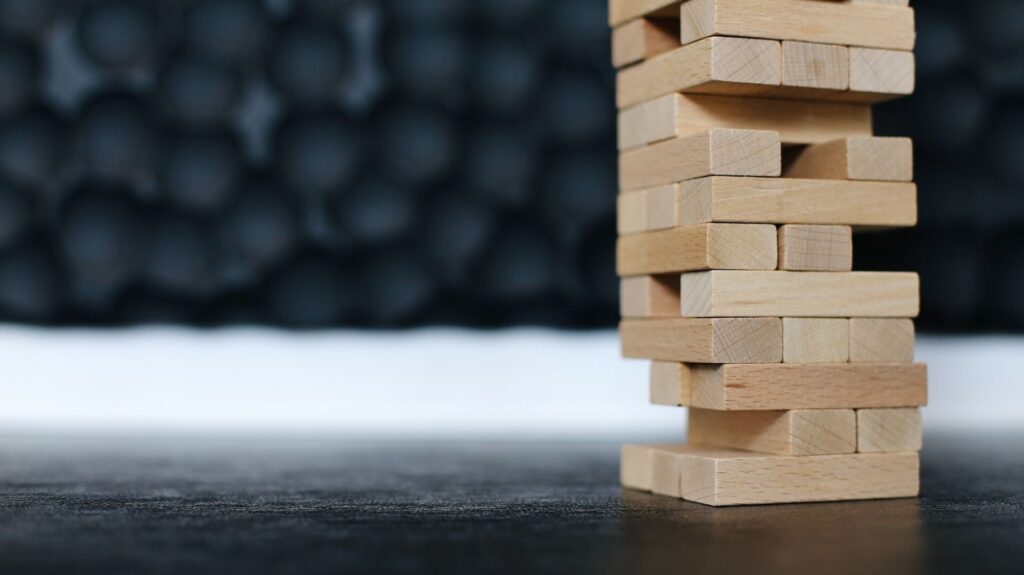 Jenga puzzle resting on top of table